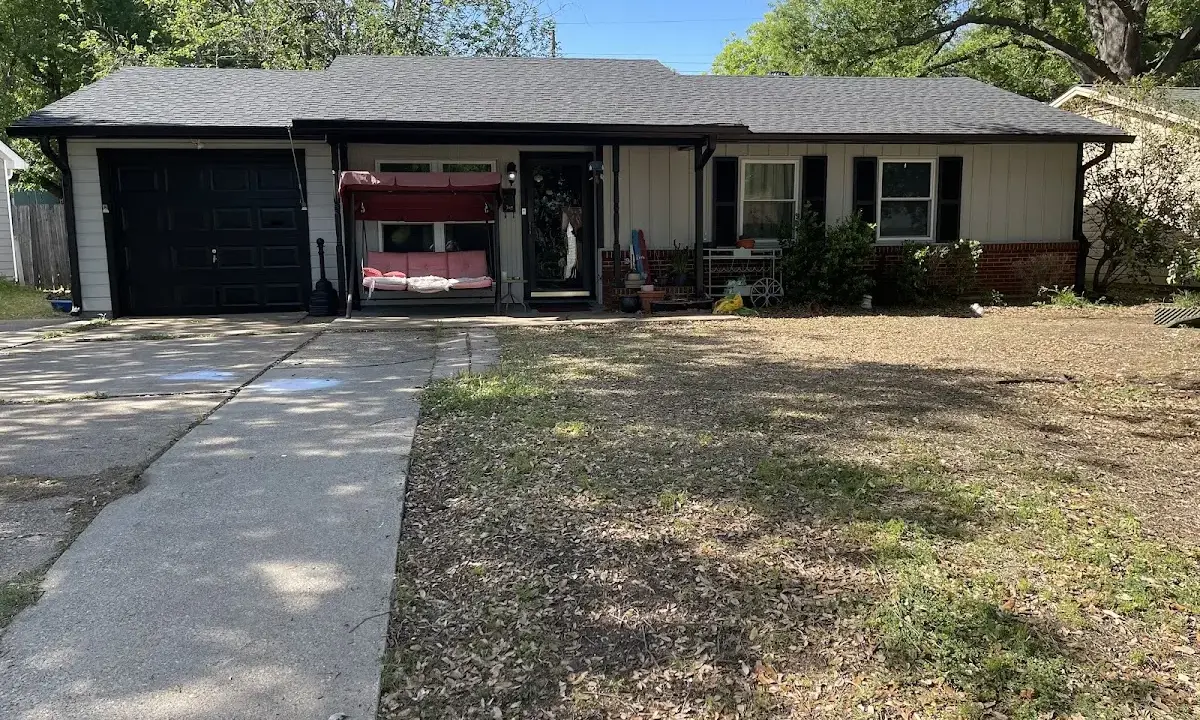 Soffit & Fascia Repair crew at work on a residential roof in Atmore